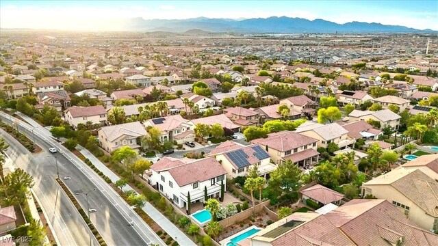 aerial perspective of suburban area featuring mountains