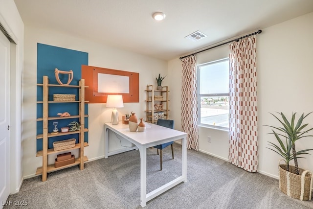 carpeted office with baseboards