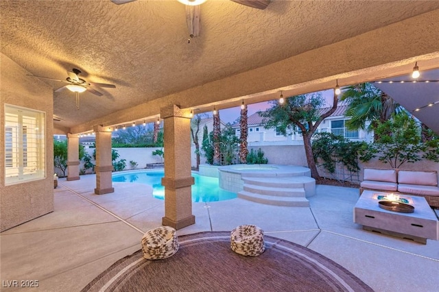 9615 Sedona Hills Ct, Las Vegas, NV 89147 - view of patio featuring a fire pit, a ceiling fan, a fenced backyard, and a pool with connected hot tub