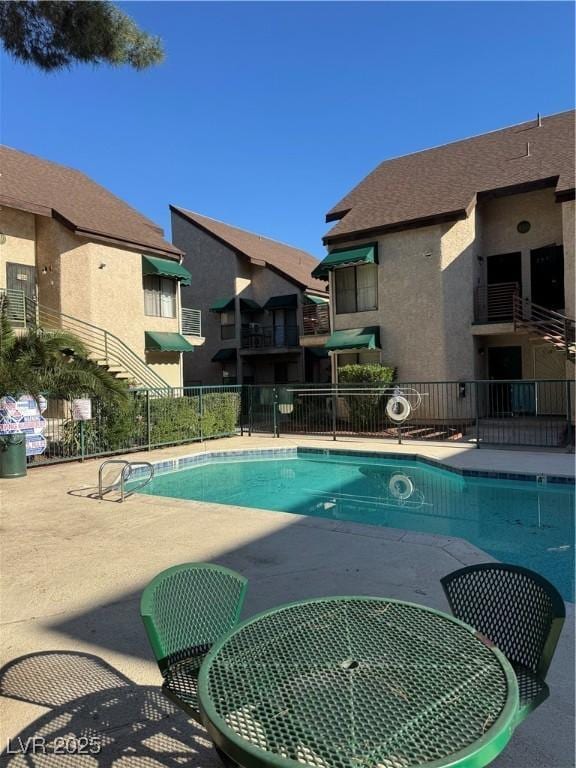 community pool with fence