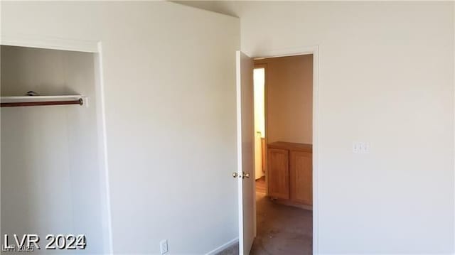unfurnished bedroom with a closet