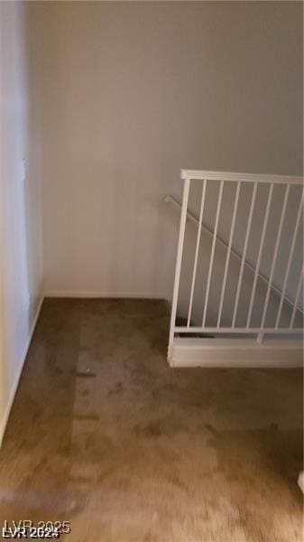 stairs with carpet flooring and baseboards