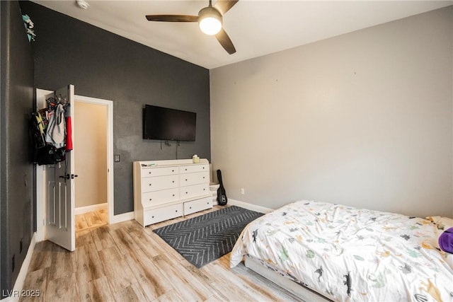 2860 Galena Peak Ln, Las Vegas, NV 89156 - bedroom featuring wood finished floors, baseboards, and ceiling fan