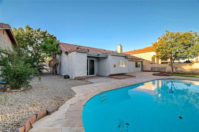 6771 Shelter Ln, Las Vegas, NV 89103 - view of swimming pool featuring a patio area and a fenced backyard