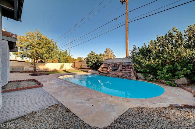 6771 Shelter Ln, Las Vegas, NV 89103 - view of swimming pool featuring a fenced backyard and a patio area