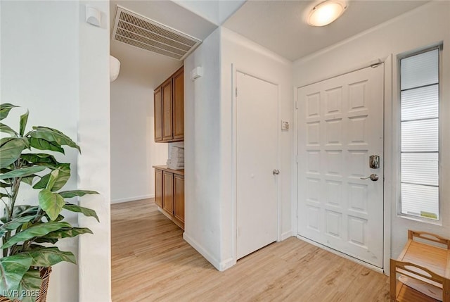6771 Shelter Ln, Las Vegas, NV 89103 - entrance foyer featuring light wood-style floors and baseboards