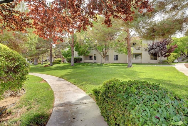 2633 S Durango Dr Unit 201, Las Vegas, NV 89117 - view of property's community featuring a lawn