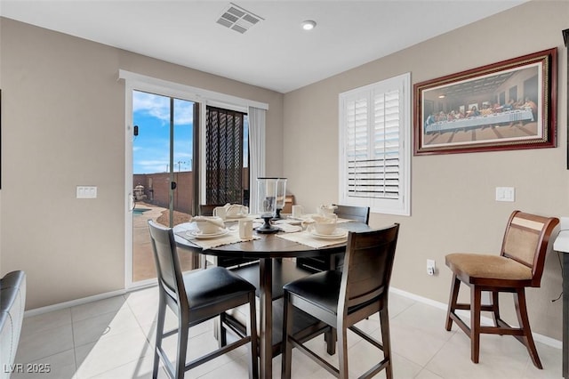 3556 Valley Lily St, North Las Vegas, NV 89032 - dining space with baseboards and light tile patterned flooring