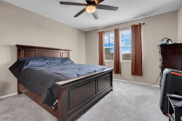 3556 Valley Lily St, North Las Vegas, NV 89032 - bedroom featuring light colored carpet, baseboards, and a ceiling fan