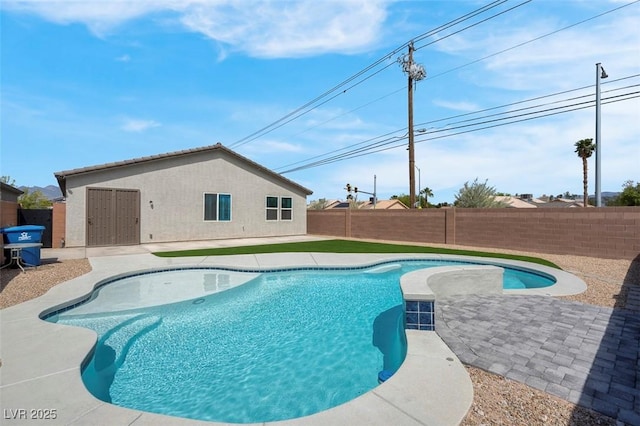3556 Valley Lily St, North Las Vegas, NV 89032 - view of swimming pool featuring a fenced backyard and a patio