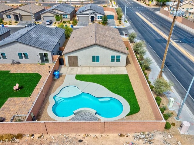 3556 Valley Lily St, North Las Vegas, NV 89032 - view of pool featuring a residential view and a fenced backyard