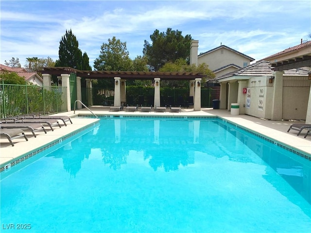 9236 Canalino Dr, Las Vegas, NV 89134 - community pool featuring fence, a patio area, and a pergola
