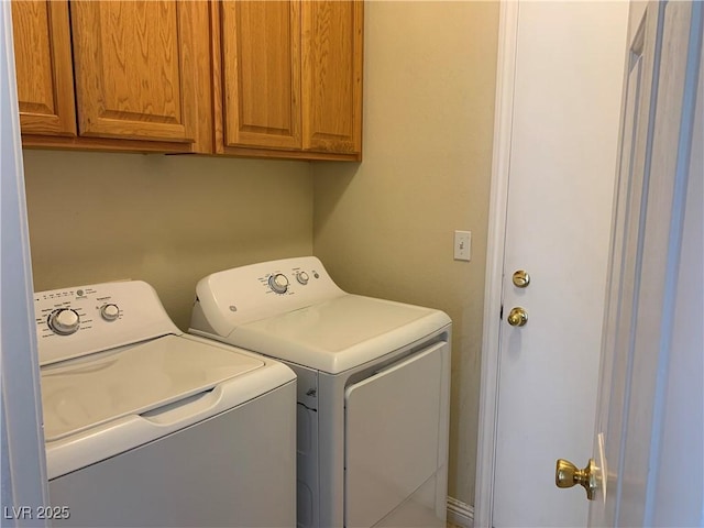 9236 Canalino Dr, Las Vegas, NV 89134 - laundry area with washing machine and clothes dryer and cabinet space