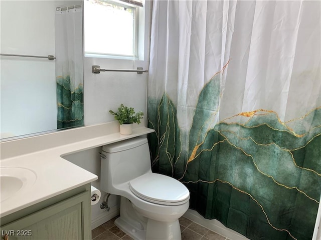 9236 Canalino Dr, Las Vegas, NV 89134 - full bath featuring vanity, toilet, and tile patterned flooring