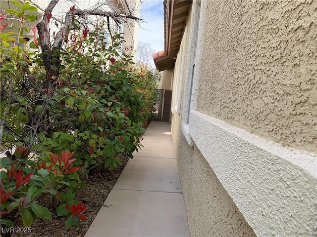 9236 Canalino Dr, Las Vegas, NV 89134 - view of side of home featuring stucco siding
