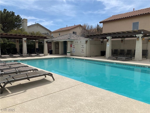 9236 Canalino Dr, Las Vegas, NV 89134 - community pool with a pergola and a patio