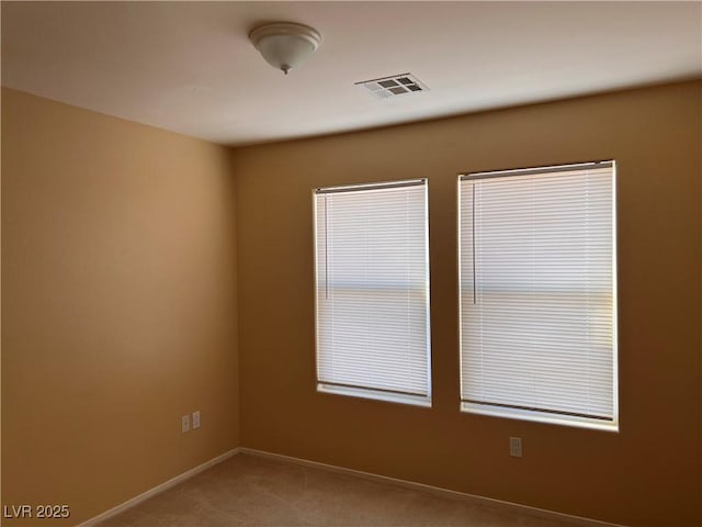 8688 Tomnitz Ave Unit 101, Las Vegas, NV 89178 - unfurnished room with light colored carpet and baseboards