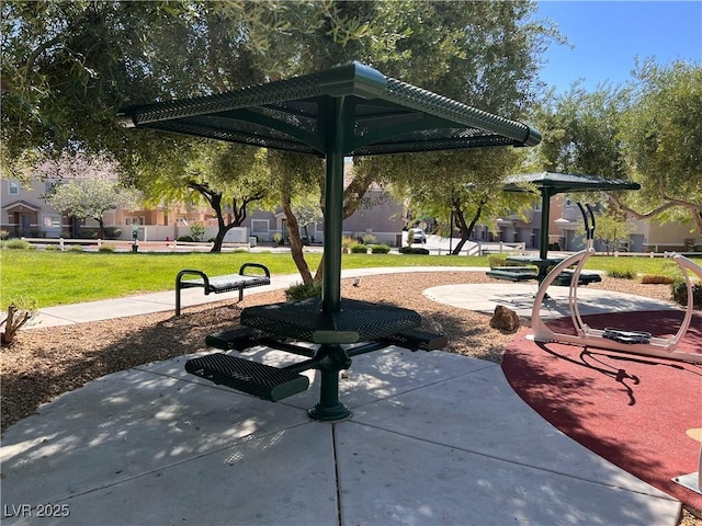 8688 Tomnitz Ave Unit 101, Las Vegas, NV 89178 - view of home's community featuring a lawn