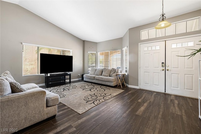 5912 Hollowridge Rd, North Las Vegas, NV 89031 - living room featuring dark wood-style flooring, baseboards, and high vaulted ceiling