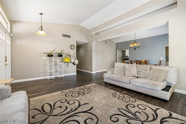 5912 Hollowridge Rd, North Las Vegas, NV 89031 - living area with wood finished floors, a chandelier, lofted ceiling, and baseboards