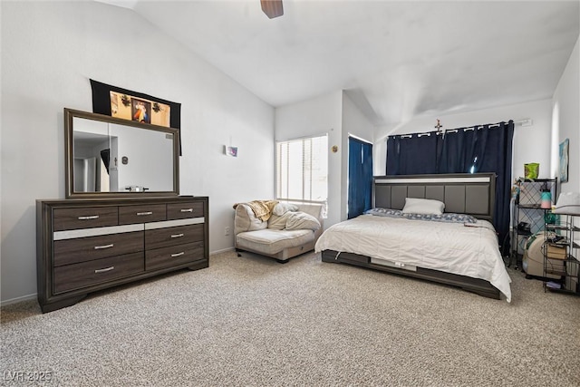5912 Hollowridge Rd, North Las Vegas, NV 89031 - carpeted bedroom featuring lofted ceiling, baseboards, and a ceiling fan