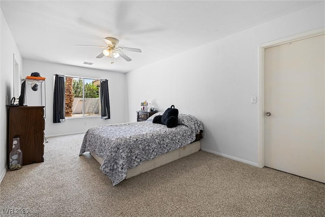 5912 Hollowridge Rd, North Las Vegas, NV 89031 - bedroom with carpet flooring, ceiling fan, and baseboards