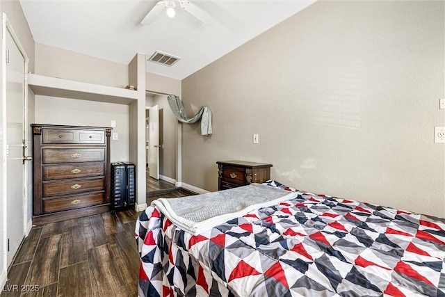 5912 Hollowridge Rd, North Las Vegas, NV 89031 - bedroom featuring dark wood-style floors, ceiling fan, and baseboards