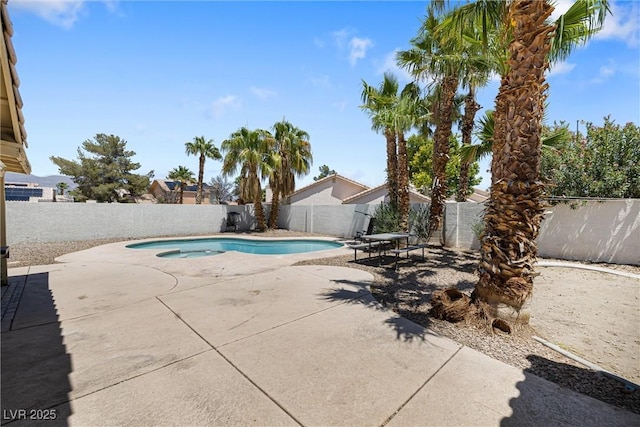 5912 Hollowridge Rd, North Las Vegas, NV 89031 - view of swimming pool featuring a patio area and a fenced backyard