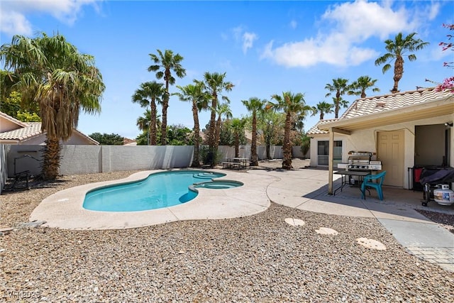 5912 Hollowridge Rd, North Las Vegas, NV 89031 - view of pool featuring a patio area, a fenced backyard, and a pool with connected hot tub