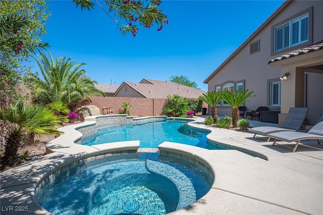 11112 Pine Greens Ct, Las Vegas, NV 89144 - view of swimming pool featuring a patio, fence, and a pool with connected hot tub
