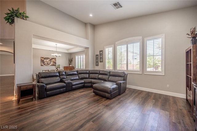 11112 Pine Greens Ct, Las Vegas, NV 89144 - living area featuring dark wood finished floors, a chandelier, baseboards, and recessed lighting