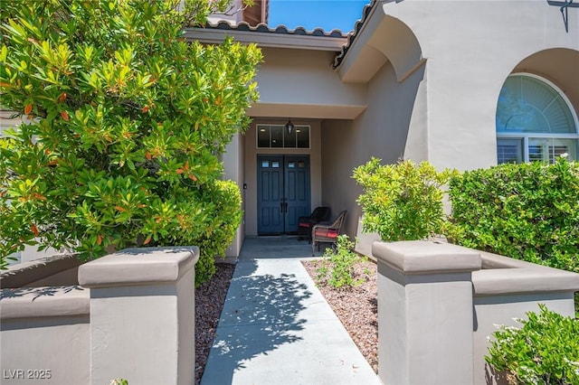 11112 Pine Greens Ct, Las Vegas, NV 89144 - property entrance featuring stucco siding and a tiled roof