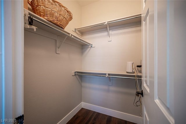 11112 Pine Greens Ct, Las Vegas, NV 89144 - spacious closet with dark wood-style floors