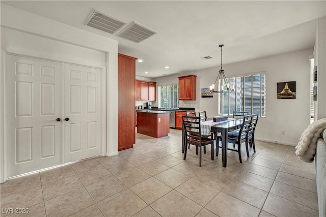 11908 Menchaca Ln, Las Vegas, NV 89138 - dining room featuring baseboards, recessed lighting, light tile patterned flooring, and a chandelier