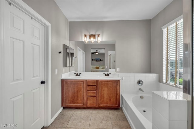 11908 Menchaca Ln, Las Vegas, NV 89138 - full bath featuring healthy amount of natural light, double vanity, tile patterned flooring, and a bath