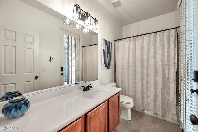 11908 Menchaca Ln, Las Vegas, NV 89138 - full bathroom featuring toilet, tile patterned floors, and vanity
