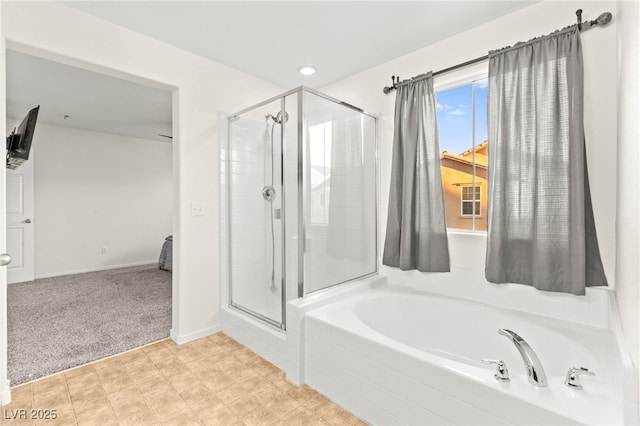 4533 Lime Straight Dr, Las Vegas, NV 89115 - bathroom featuring a shower stall, a garden tub, and tile patterned floors