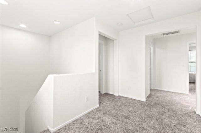 4533 Lime Straight Dr, Las Vegas, NV 89115 - empty room featuring carpet floors, attic access, baseboards, and recessed lighting