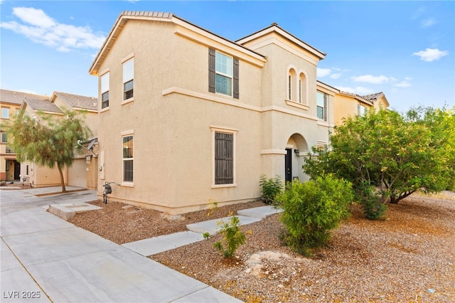 4533 Lime Straight Dr, Las Vegas, NV 89115 - view of front of home featuring stucco siding