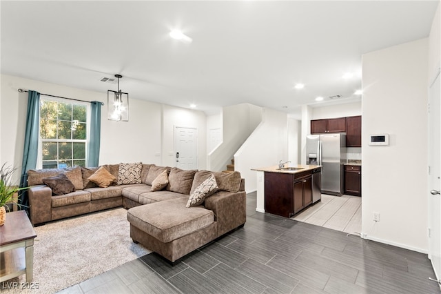 4533 Lime Straight Dr, Las Vegas, NV 89115 - living area featuring recessed lighting, stairway, and baseboards