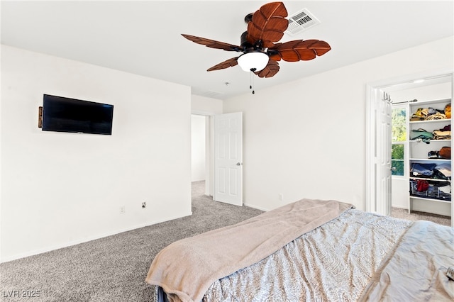 4533 Lime Straight Dr, Las Vegas, NV 89115 - bedroom with carpet, a ceiling fan, and a spacious closet