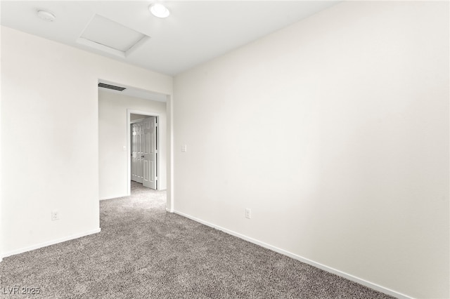 4533 Lime Straight Dr, Las Vegas, NV 89115 - spare room with attic access, carpet flooring, and baseboards