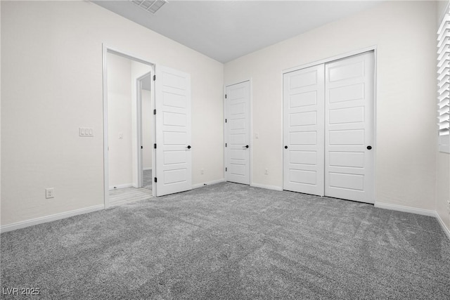 717 Monroe Hill Pl, Henderson, NV 89011 - unfurnished bedroom featuring carpet floors, a closet, and baseboards