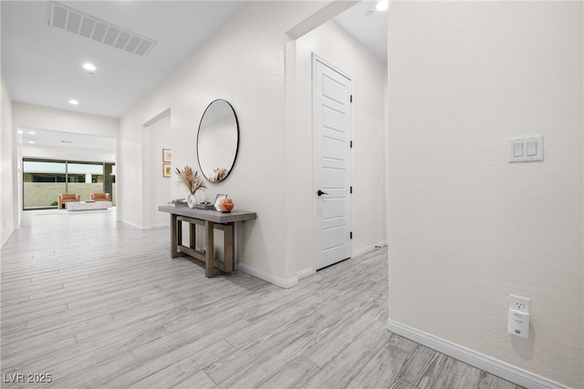 717 Monroe Hill Pl, Henderson, NV 89011 - hall with baseboards, light wood-style floors, and recessed lighting