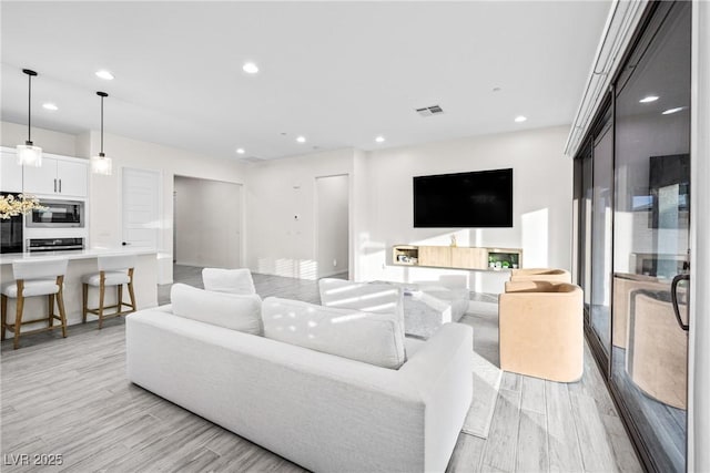 717 Monroe Hill Pl, Henderson, NV 89011 - living area with recessed lighting and light wood finished floors