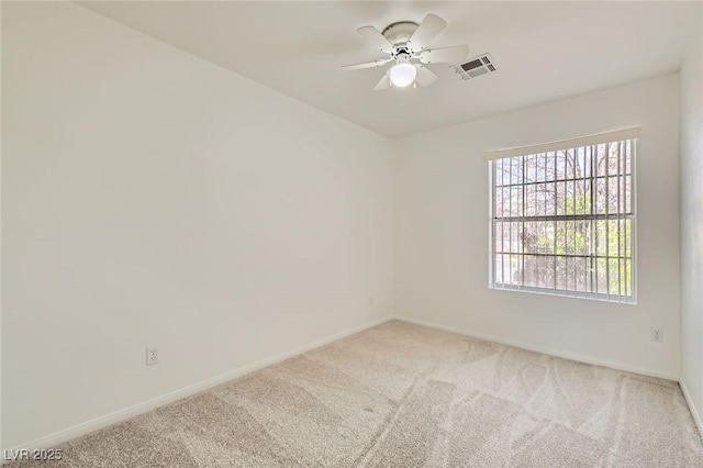3912 Branchwood Dr, North Las Vegas, NV 89032 - unfurnished room featuring light carpet, baseboards, and a ceiling fan