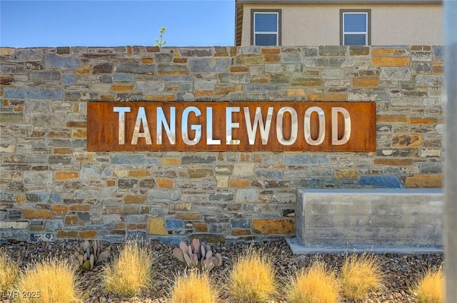 view of community sign