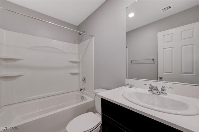 full bathroom featuring toilet,  shower combination, and vanity