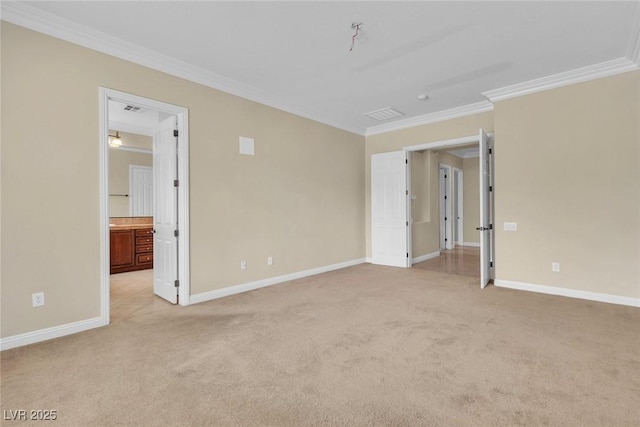 7505 Java Sparrow St, North Las Vegas, NV 89084 - empty room featuring crown molding, light carpet, and baseboards