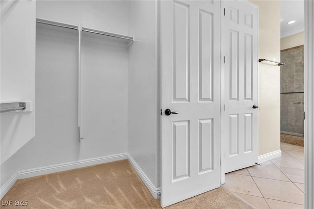 7505 Java Sparrow St, North Las Vegas, NV 89084 - walk in closet featuring light tile patterned floors